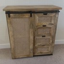 RATTAN CABINET WITH SLIDING DOOR.